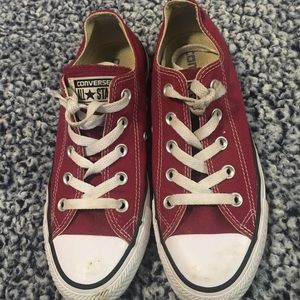 Red converse with white shoe lace